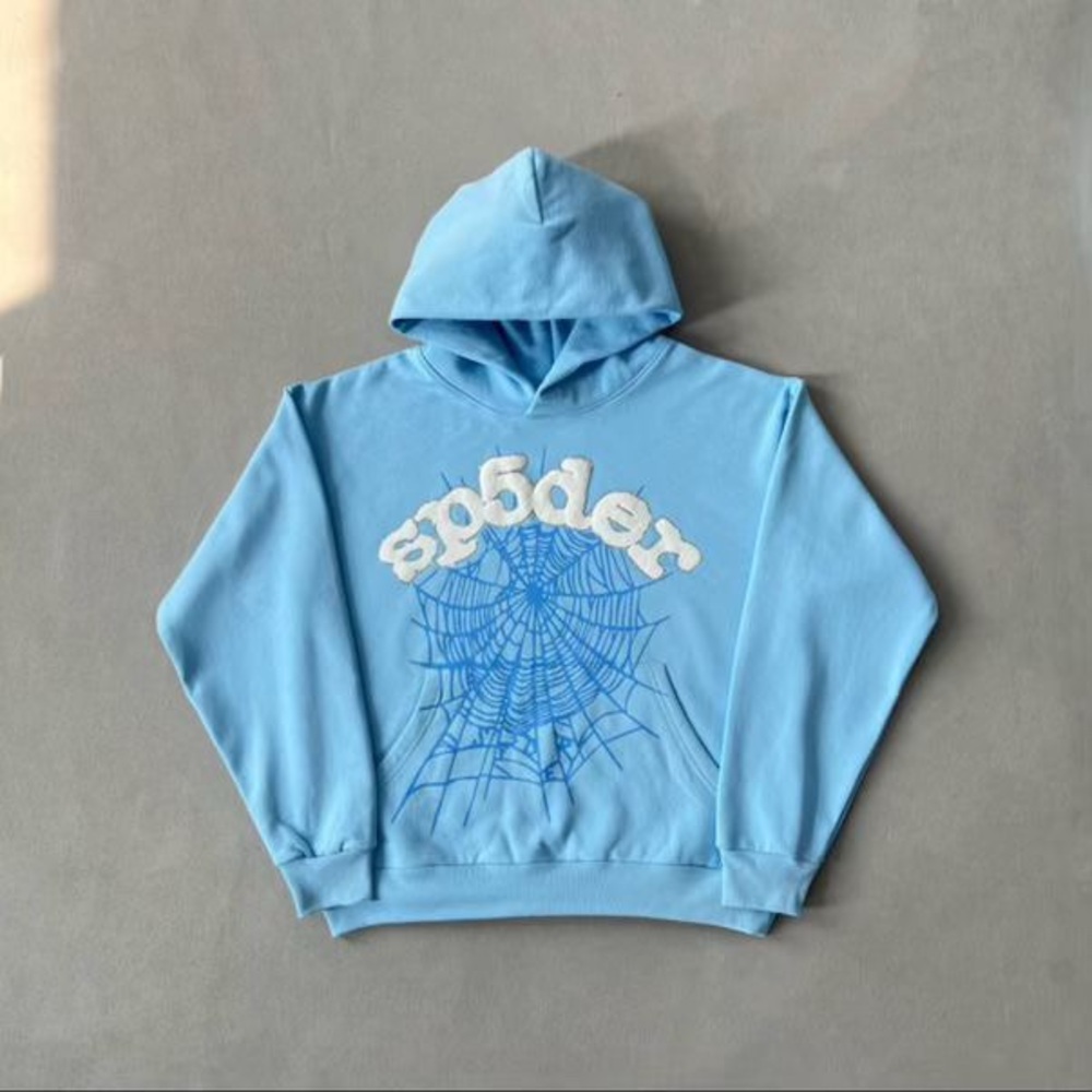 Light Blue sp5der Jacket with Floral Graphic Design